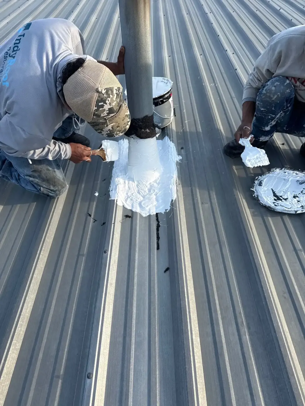 Tarping and dry-in on a Goshen commercial roof